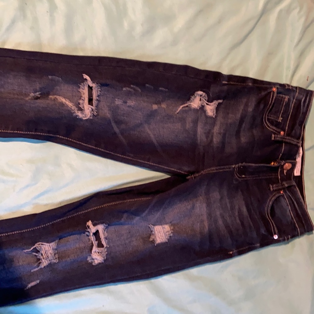 Women’s ripped high rise jeans